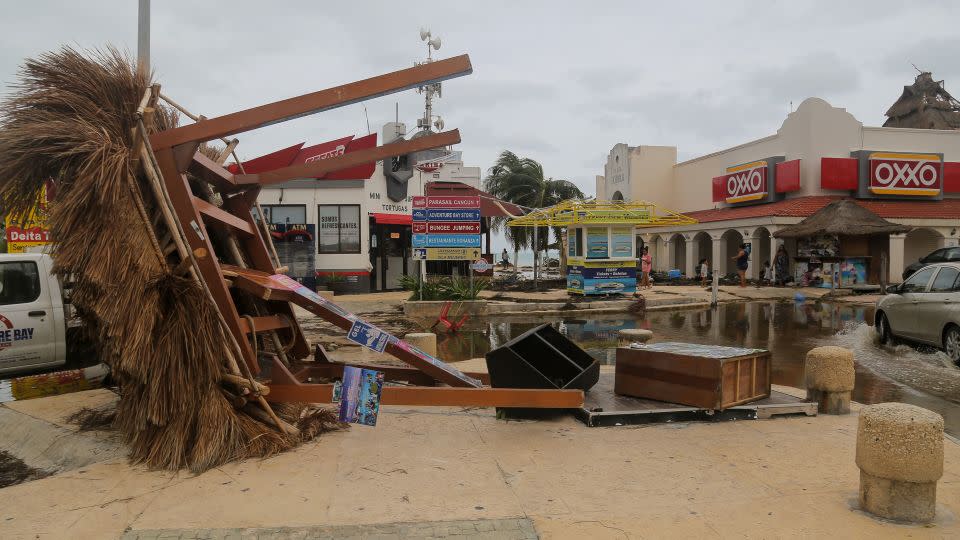 An information kiosk lies on the ground in October 2020 after Hurricane Delta's winds knocked it over in Cancun, Mexico. - Erick Marfil/Getty Images