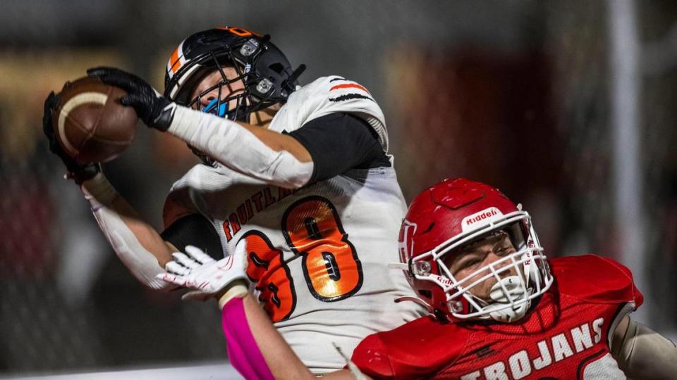 Fruitland tight end Quinn Hood holds onto a touchdown pass last year against Homedale. He’s one of four returning offensive starters for the Grizzlies.