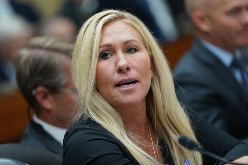 Rep. Marjorie Taylor Greene, R-Ga., listens to testimony. Photo by Bonnie Cash/UPI