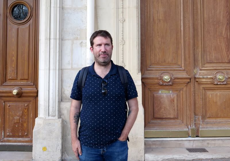 Christophe Naudin, Bataclan survivor, poses during an interview with Reuters in Paris