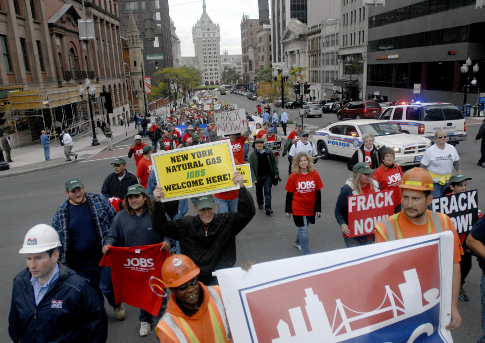 Demonstrators in favor of responsible natural gas drilling in New York march up State Street in Albany, N.Y. on Monday, Oct. 15, 2012. A few hundred people gathered at the Capitol to call for job creation and economic opportunity through natural gas development. (AP Photo/Tim Roske)