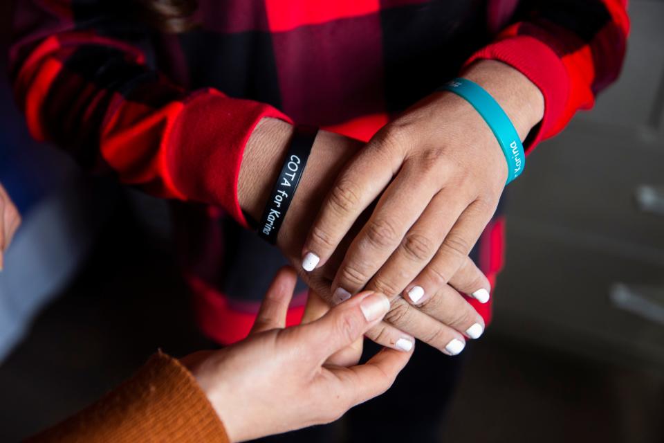 Karina Cano Perez displays her custom bracelets on Tuesday, Dec. 19, 2023, at her home.