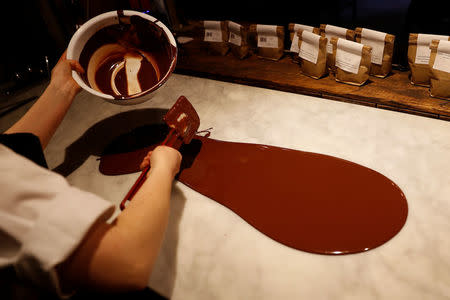 A chocolatier prepares chocolate at Rabot 1745, in London, Britain December 1, 2017. REUTERS/Peter Nicholls