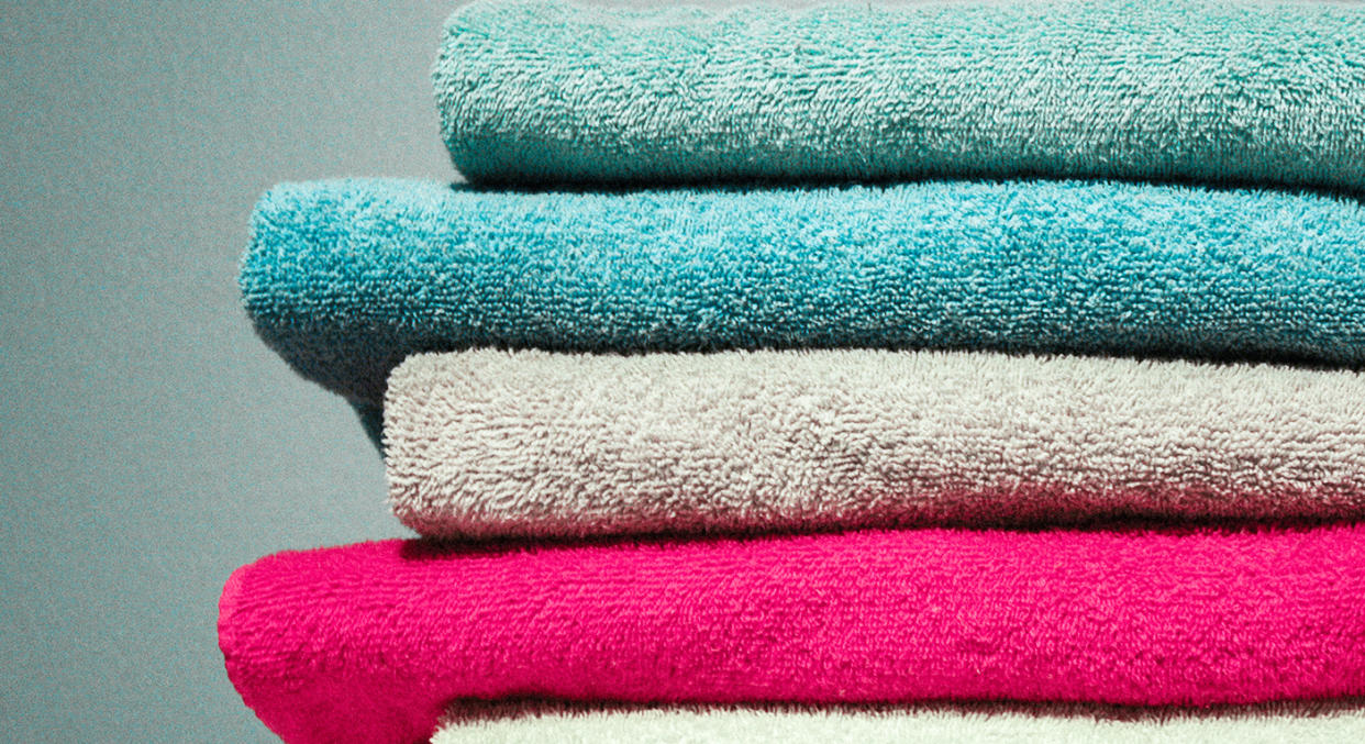 Experts claim you should be washing your kitchen towels every day and your bath towels every three days. [Photo: Getty]