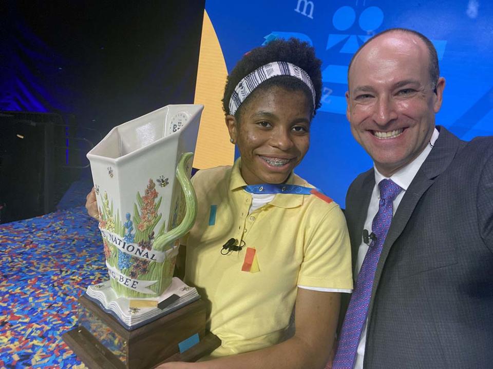 Adam Symson takes  an on-stage selfie with champion Zaila Avant-garde at the Scripps National Spelling Bee.