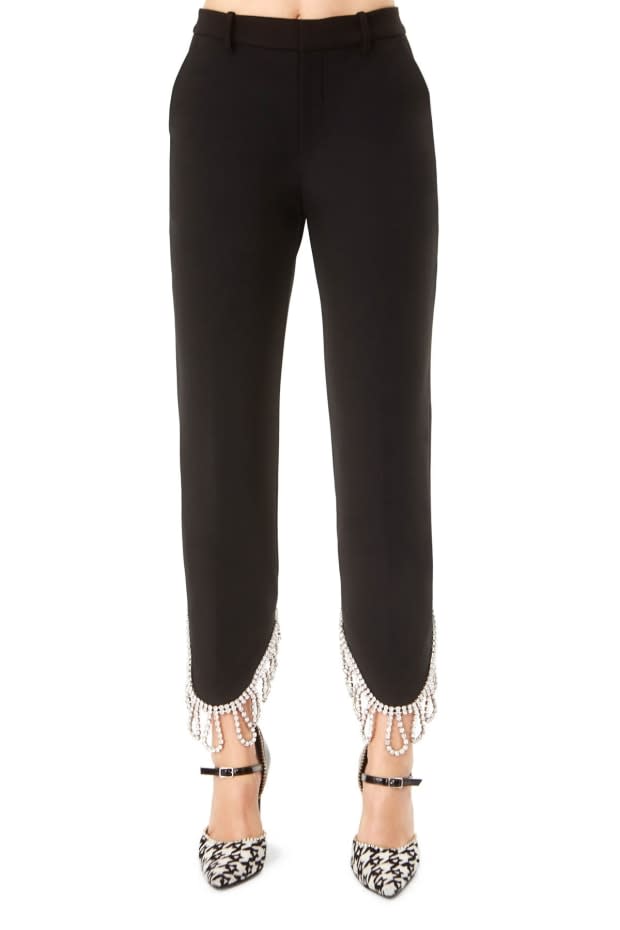 <p>Area Crystal Trim Trouser, $1,080, <a href="https://area.nyc/collections/all/products/crystal-trim-trouser" rel="nofollow noopener" target="_blank" data-ylk="slk:available here;elm:context_link;itc:0;sec:content-canvas" class="link ">available here</a>.</p>