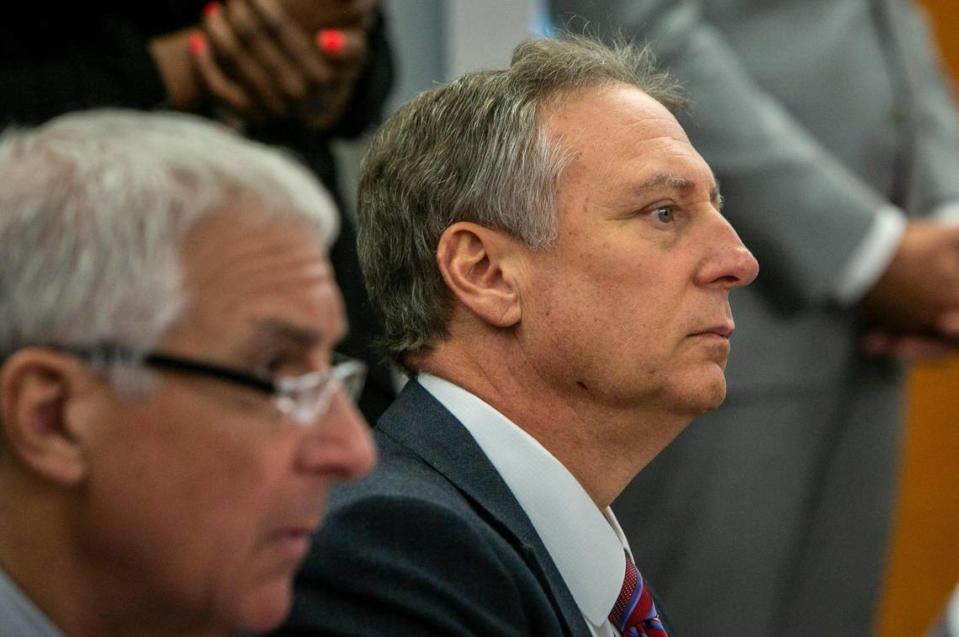 Michael Goldberg, receiver for the Champlain Towers South Condo Association, right, and Paul Singerman, lawyer for the receiver, listen during a hearing to discuss the litigation involved with the building collapse. The hearing took place in Miami at Miami-Dade Children’s Courthouse, 155 NW Third Street on Wednesday, July 14, 2021.