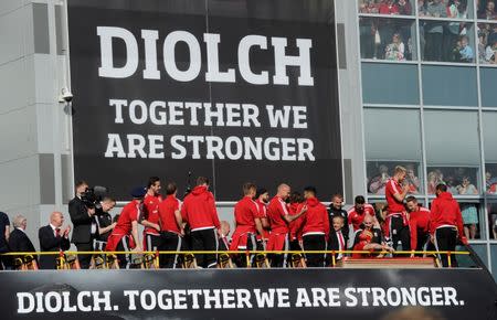 Britain Football Soccer - Wales - EURO 2016 Homecoming Celebrations - Cardiff, Wales - 8/7/16 The Wales team bus arrives at Cardiff City Stadium REUTERS/Rebecca Naden Livepic