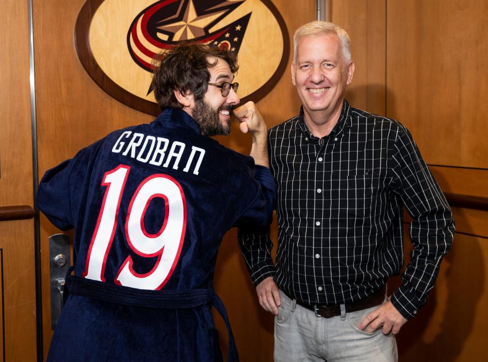 Gary O'Brien has a fun moment with singer Josh Groban.