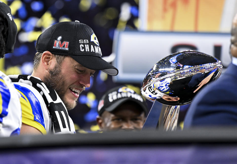Los Angeles Rams quarterback Matthew Stafford (9) holds onto the Lombardi Trophy after defeating the Cincinnati Bengals 23-20 in Super Bowl LVI. (Wally Skalij / Los Angeles Times via Getty Images)