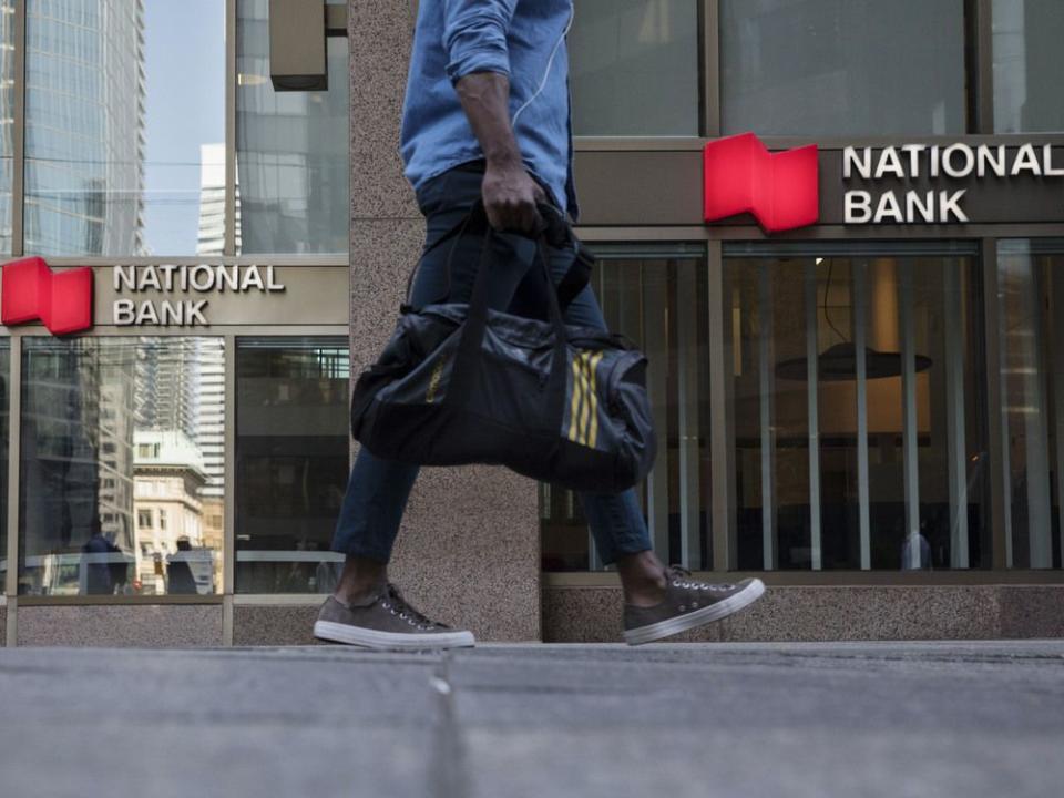 Commuters On Bay Street As Canadian Stocks Mixed