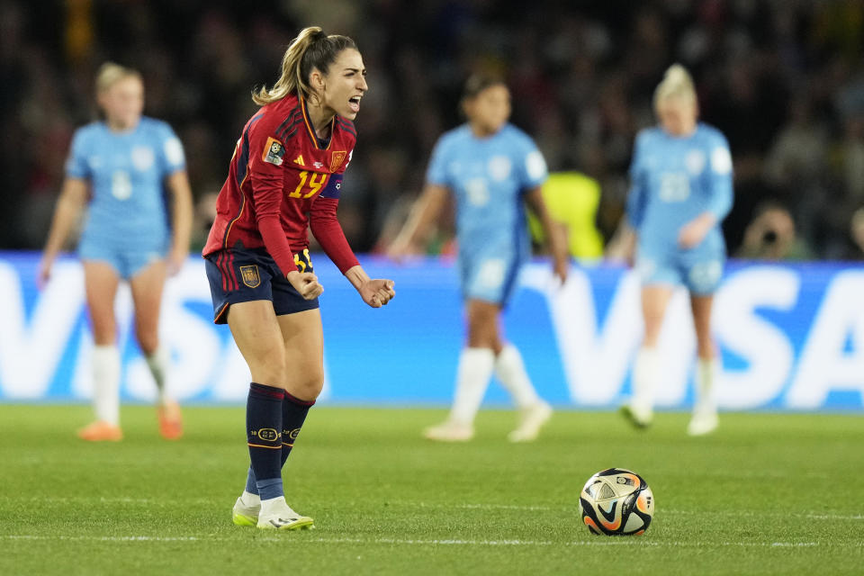 Spain's Olga Carmona celebrates after scoring the opening goal during the final of Women's World Cup soccer between Spain and England at Stadium Australia in Sydney, Australia, Sunday, Aug. 20, 2023. (AP Photo/Rick Rycroft)