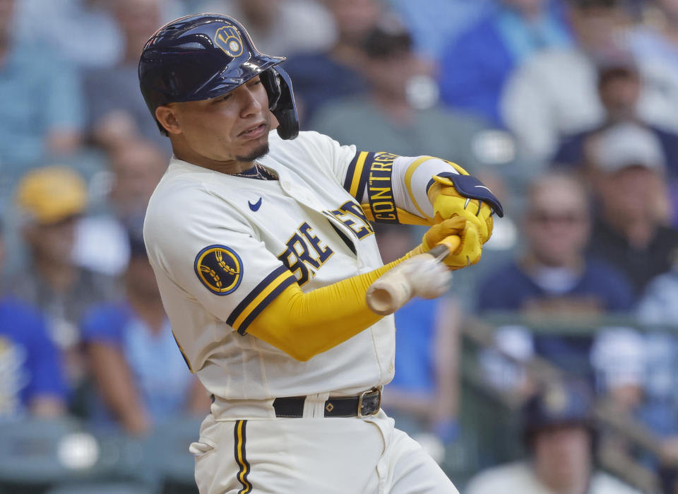 Milwaukee Brewers' William Contreras hits a double against the Miami Marlins during the fourth inning of a baseball game Thursday, Sept. 14, 2023, in Milwaukee. (AP Photo/Jeffrey Phelps)