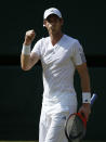 Great Britain's Andy Murray celebrates a point in his Men's Final against Great Serbia's Novak Djokovic during day thirteen of the Wimbledon Championships at The All England Lawn Tennis and Croquet Club, Wimbledon.