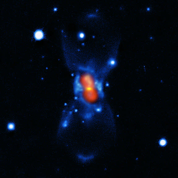 The remnant of CK Vulpeculae, previously known as the oldest recorded nova. Shown here, CK Vulpeculae is surrounded by a dusty torus (yellow), cool molecular gas (red) and hot atomic gas (blue). This image was taken using APEX & SMA (dust and m