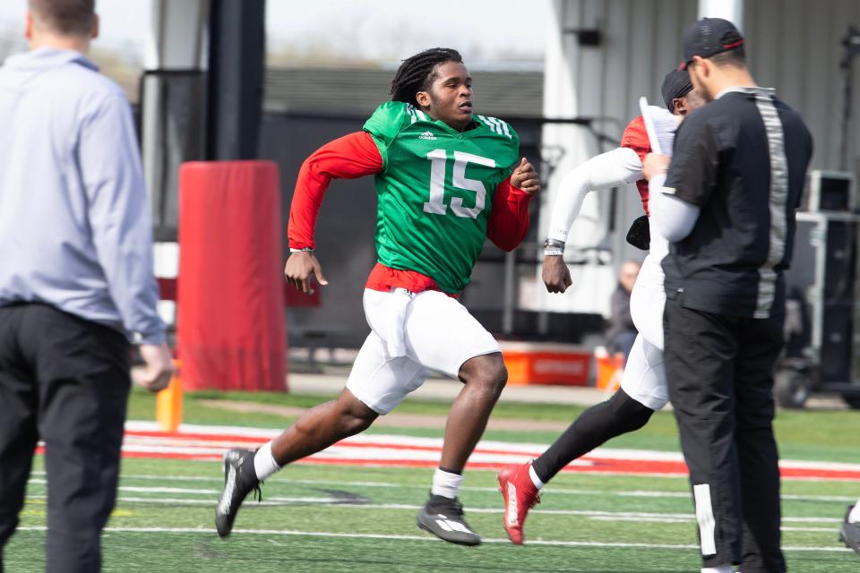 Rutgers quarterback Ajani Sheppard warms up before Rutgers University football spring practice at Marco Battaglia Practice Complex in Piscataway, NJ Tuesday April 11, 2023.