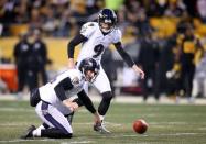 Dec 25, 2016; Pittsburgh, PA, USA; Baltimore Ravens punter Sam Koch (4) fumbles the ball on a field goal attempt against the Pittsburgh Steelers during the second quarter at Heinz Field. Mandatory Credit: Charles LeClaire-USA TODAY Sports