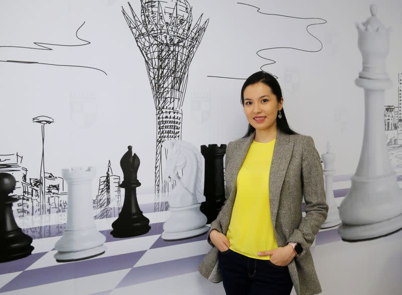 Kazakh chess player and social activist Dinara Saduakassova poses for a picture in the Chess Academy in Nur-Sultan