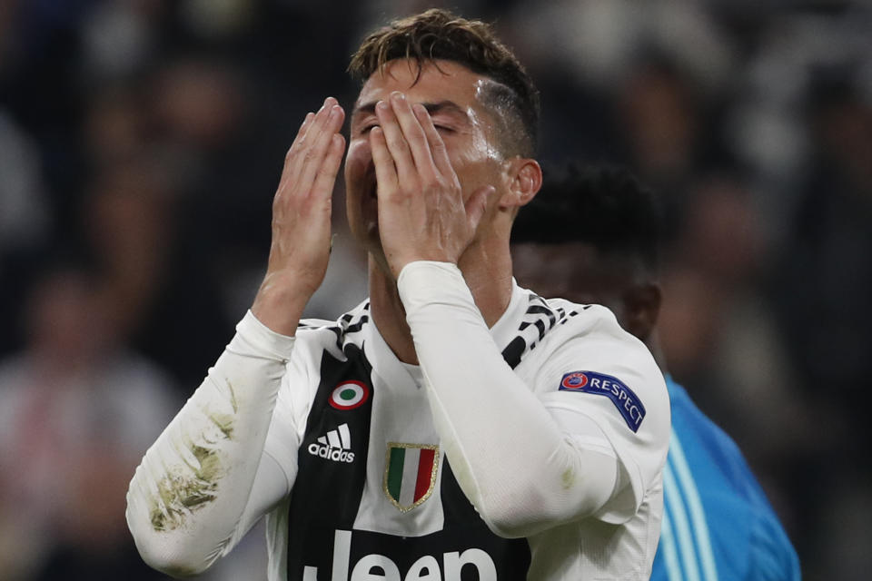 Juventus' Cristiano Ronaldo reacts after missing a scoring chance during the Champions League quarter final, second leg soccer match between Juventus and Ajax, at the Allianz stadium in Turin, Italy, Tuesday, April 16, 2019. (AP Photo/Antonio Calanni)