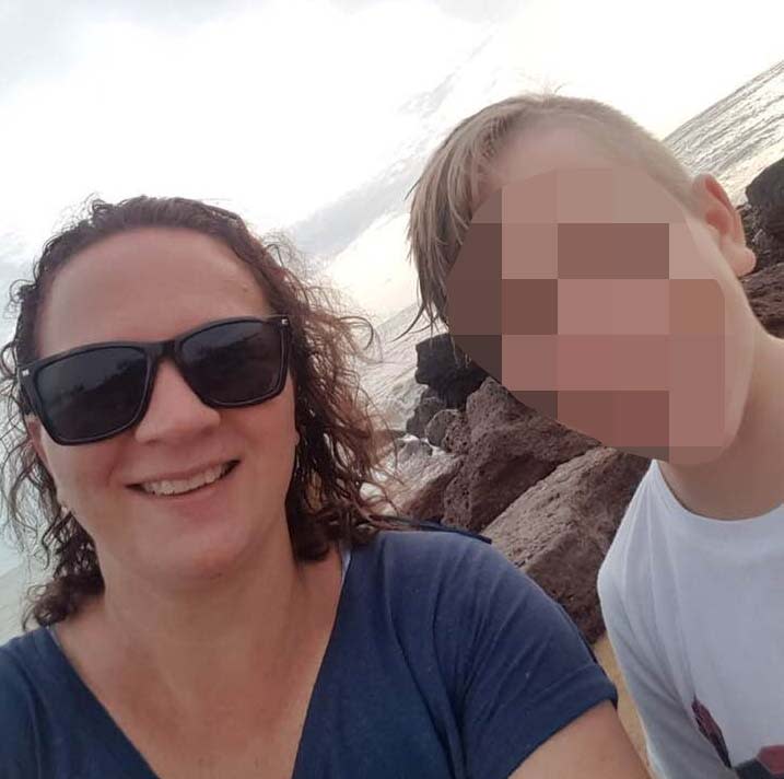 Donna Dwyer pictured in sunglasses with one of her sons. 