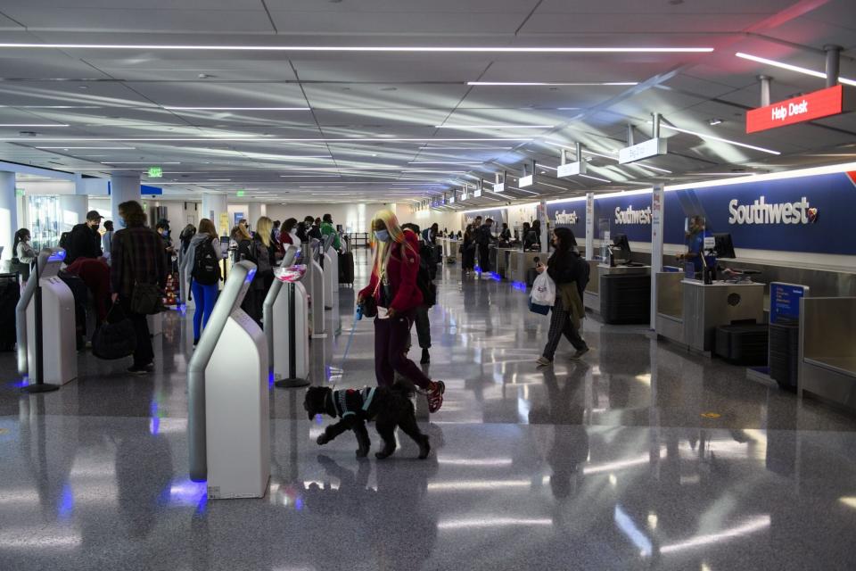 Passengers check-in for a Southwest Airlines flight