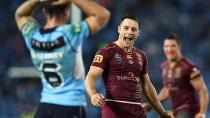 Cooper Cronk is a happy chappy as James Maloney looks on in despair.