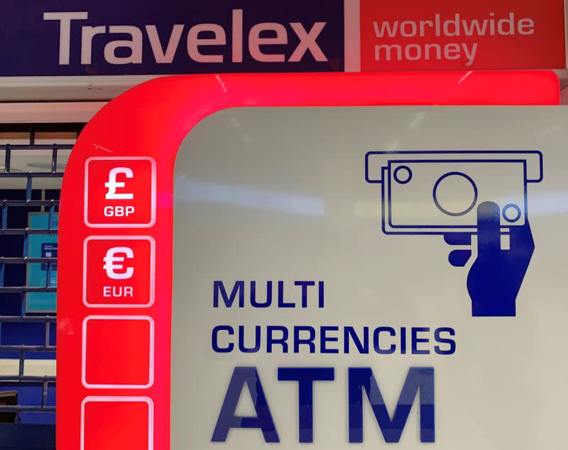 Signage is seen above a Travelex ATM at Manchester Airport in Manchester