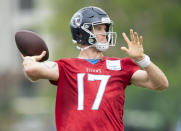 Tennessee Titans quarterback Ryan Tannehill throws a pass during an NFL football practice Thursday, June 10, 2021, in Nashville, Tenn. (George Walker IV/Pool Photo via AP)