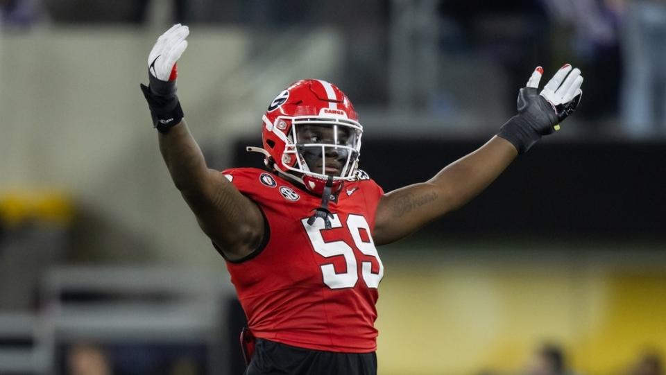 Georgia Bulldogs offensive lineman Broderick Jones celebrates against the TCU Horned Frogs during the CFP national championship game at SoFi Stadium.