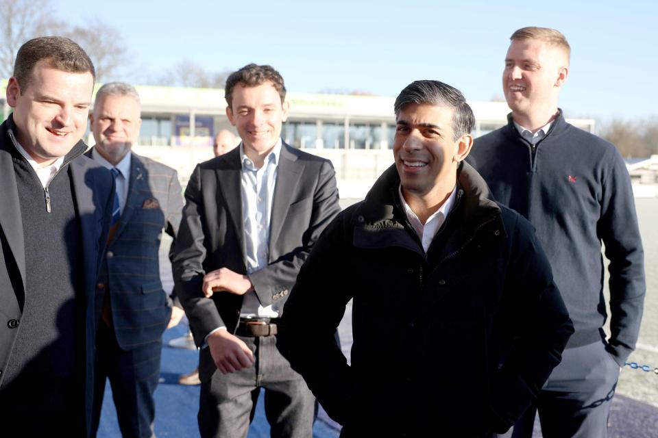 Prime minister Rishi Sunak (second right) speaks with Eastleigh FC players and staff (PA)