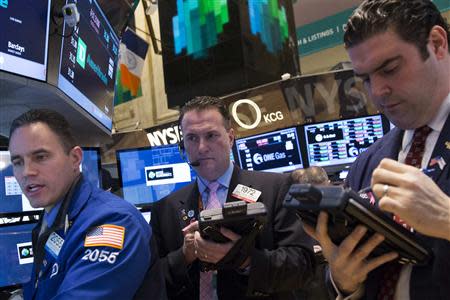 Traders work on the floor of the New York Stock Exchange (NYSE) February 10, 2014. REUTERS/Brendan McDermid