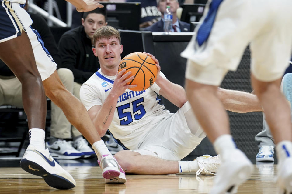 Creighton's Baylor Scheierman looks to pass the ball during the first half of a college basketball game against Akron in the first round of the NCAA men's tournament Thursday, March 21, 2024, in Pittsburgh. (AP Photo/Matt Freed)