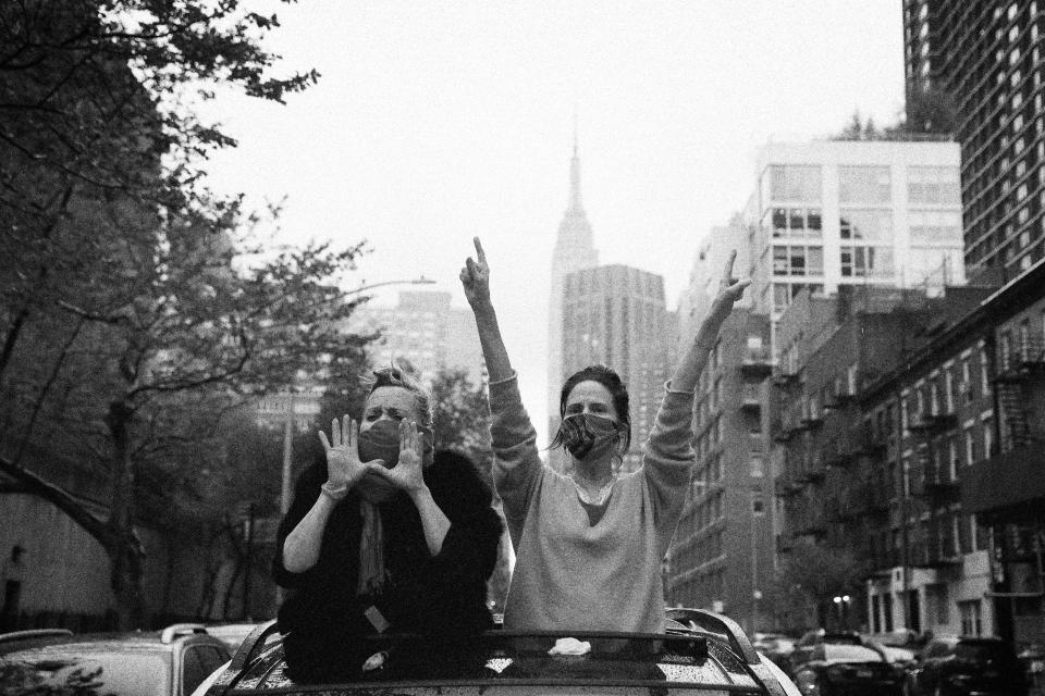 Image: People cheer for health care workers outside of NYU Langone Health on National Nurse Day in New York on May 6, 2020. (Andrew Kelly / Reuters file)