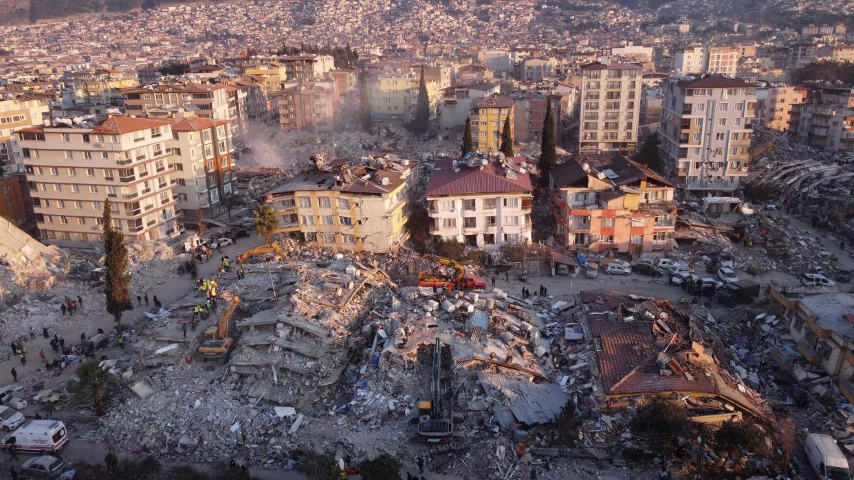 Collapsed buildings in Antakya on Saturday, after a 7.8-magnitude earthquake struck the country's southeast last week. (Hassan Ayadi / AFP - Getty Images)