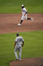 Baltimore Orioles' Maikel Franco, top, runs the bases after hitting a two-run home run off New York Yankees relief pitcher Wandy Peralta (58) during the seventh inning of a baseball game, Sunday, May 16, 2021, in Baltimore. Orioles' Pedro Severino scored on the play. (AP Photo/Julio Cortez)