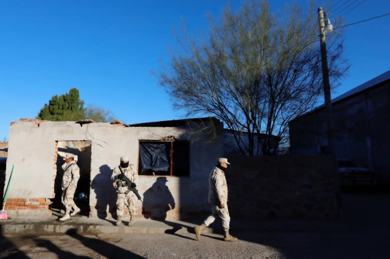 Soldiers are seen in Bavispe town near La Mora