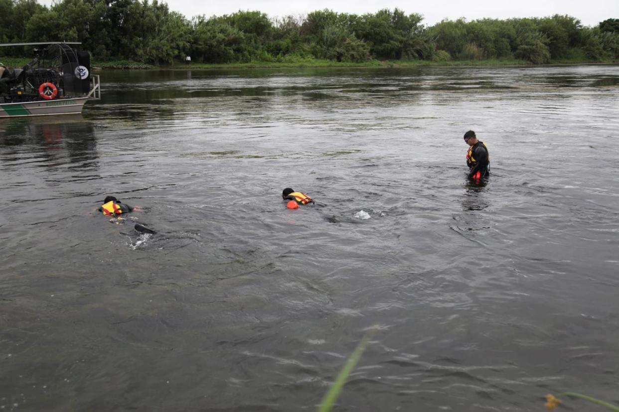 Image: Del Rio Sector Border Patrol agents lead search for missing 2-year-old Haitian girl in Rio Grande River.