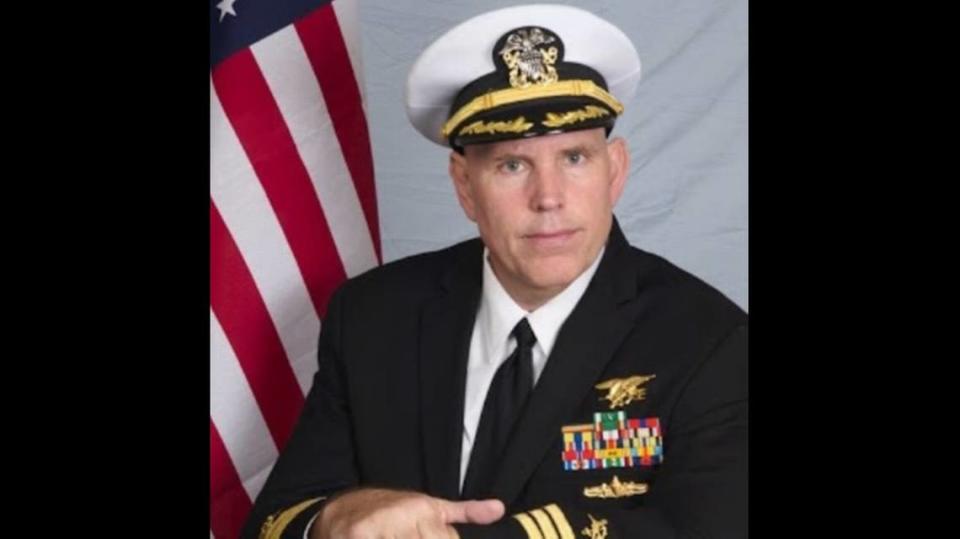 Miami’s Joseph Fucheck, seen posing in a Navy uniform, never served in the U.S. military.