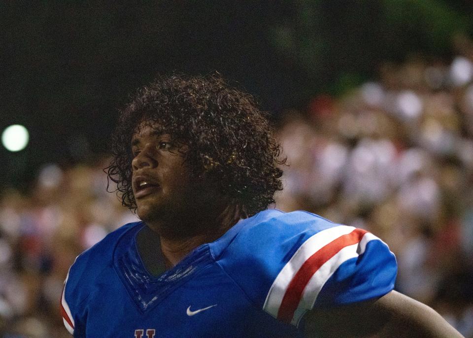 Memphis University School offensive linemen Marcus Henderson (75) on the sideline during the second quarter of a home game against Christian Brothers Friday, September 6, 2019. 