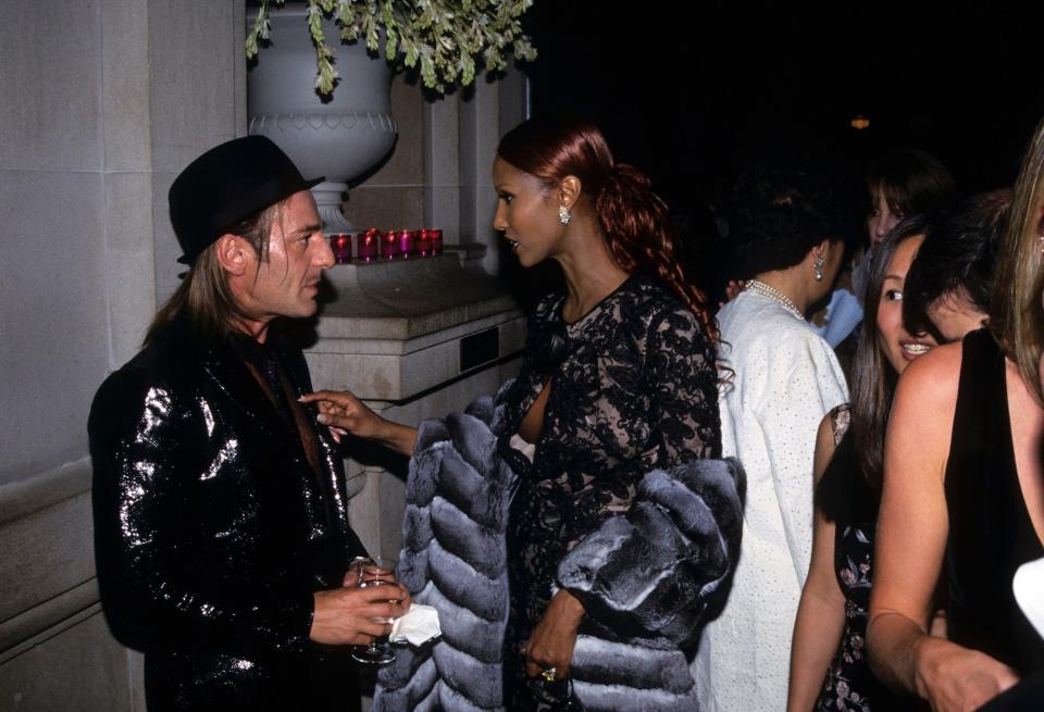 John Galliano and Iman at the 1999 Met Gala.