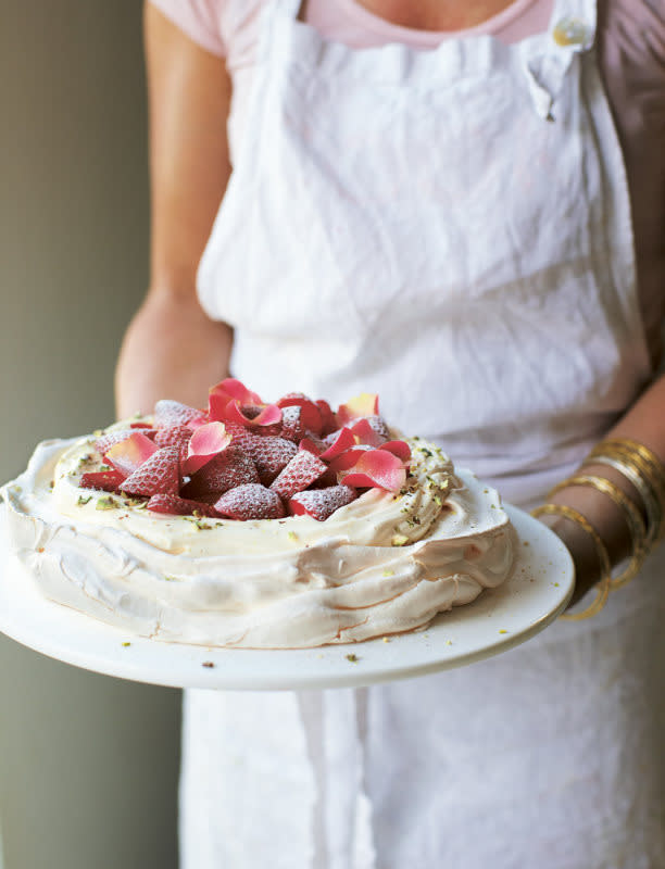 <p>Ali Allen</p><p>Vibrant strawberries, rose water, and a scattering of fragrant, fresh rose petals elevate the pavlova to a confection worthy of a memorable celebration feast.</p><p><strong>Get the recipe: <a href="https://parade.com/281437/smccook/a-heavenly-naturally-gluten-free-spring-pavlova/" rel="nofollow noopener" target="_blank" data-ylk="slk:Rose Water and Pistachio Pavlova with Strawberries;elm:context_link;itc:0;sec:content-canvas" class="link rapid-noclick-resp">Rose Water and Pistachio Pavlova with Strawberries</a></strong></p>