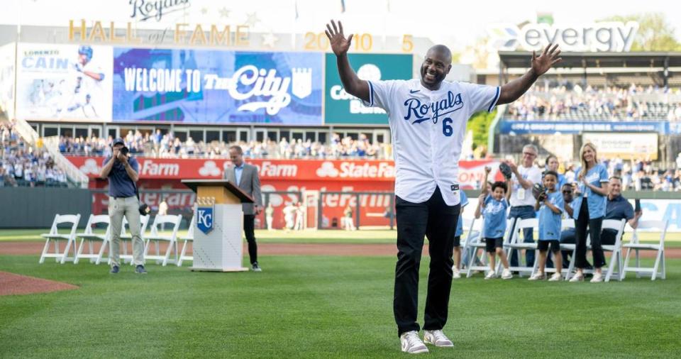 Former Kansas City Royals center fielder Lorenzo Cain waves to fans during a retirement ceremony at Kauffman Stadium on Saturday, May 6, 2023, in Kansas City. Cain signed a ceremonial one-day contract to retire as a Royal.