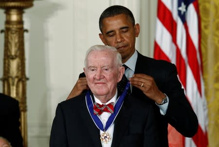 U.S. President Obama awards a 2012 Presidential Medal of Freedom to former Associate Justice of the U.S. Supreme Court Stevens during ceremony in the East Room of the White House in Washington