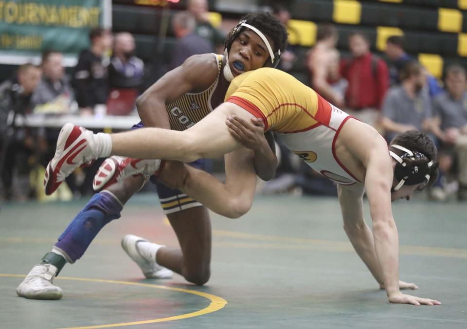 Copley's Kyren Butler, left, wrestles Brecksville's Devin Miller in early rounds during the 2020 Bill Dies Memorial Tournament.