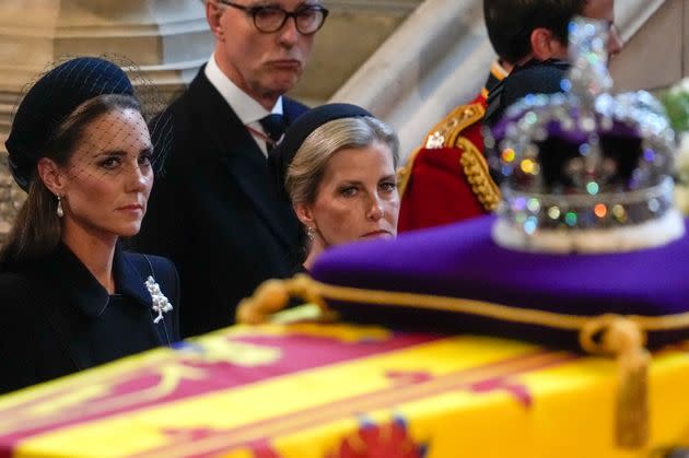 The Princess of Wales and Sophie, Countess of Wessex, watch the coffin of Queen Elizabeth arrive in Westminster Hall on Sep. 14. (Photo: WPA Pool via Getty Images)