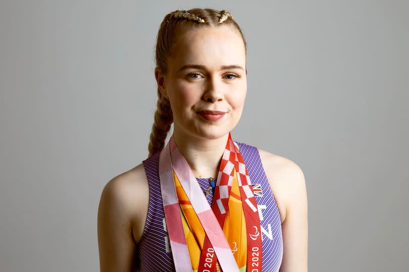 Maria with her five medals.