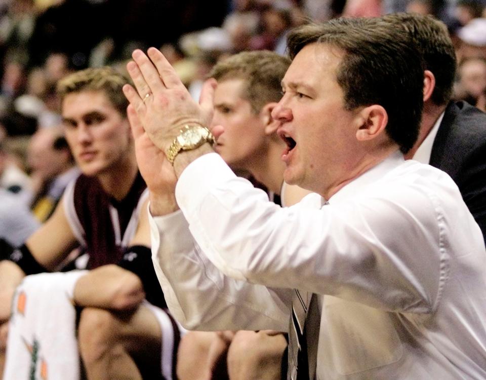 Southwest Missouri State head coach Barry Hinson yells instructions to his players in the first half of their semifinal game against Southern Illinois in the Missouri Valley Conference Tournament Sunday, March 3, 2002 at the Savvis Center in St. Louis.