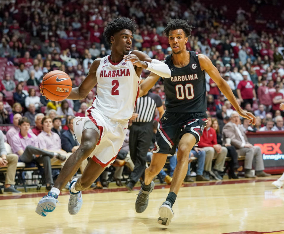 Alabama Crimson Tide guard Kira Lewis Jr. (2) drives to the basket against South Carolina Gamecocks guard A.J. Lawson (00) during a game on Feb. 29, 2020. (Marvin Gentry-USA TODAY Sports)