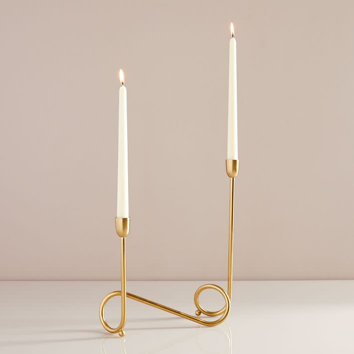 <p><a href="https://go.redirectingat.com?id=74968X1596630&url=https%3A%2F%2Fwww.westelm.com%2Fproducts%2Fmetal-loop-candelabra-d5609&sref=https%3A%2F%2Fwww.cosmopolitan.com%2Flifestyle%2Fg35887015%2Framadan-decoration-ideas%2F" rel="nofollow noopener" target="_blank" data-ylk="slk:Shop Now;elm:context_link;itc:0;sec:content-canvas" class="link ">Shop Now</a></p><p>Loop Polished Brass Candelabra</p><p>westelm.com</p><p>$48.00</p>