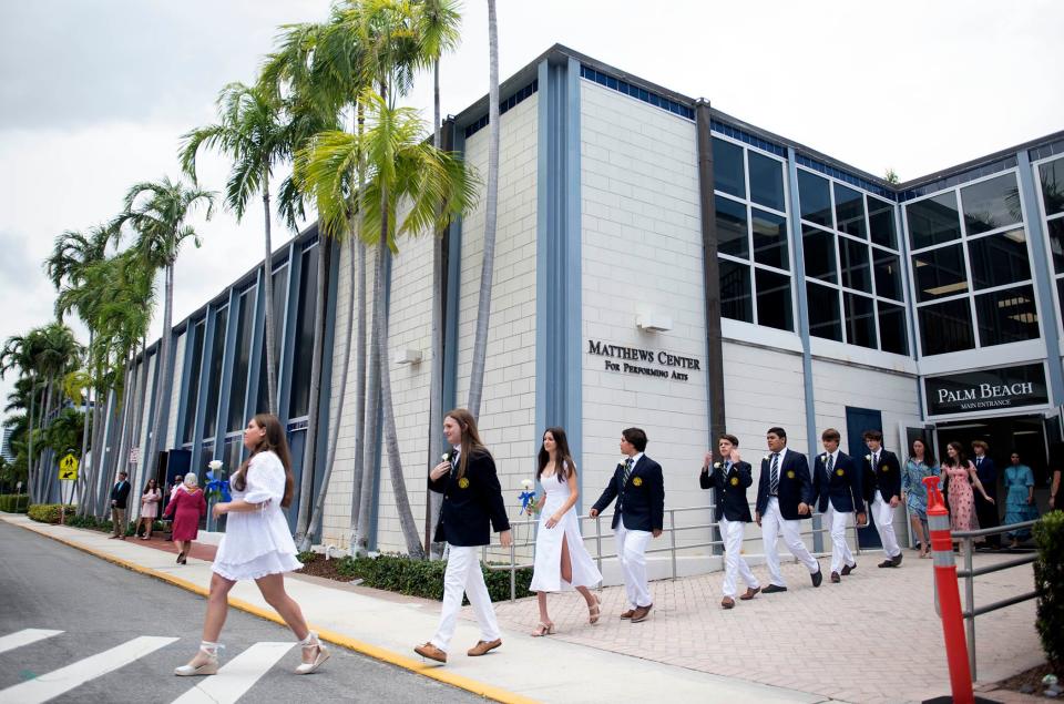 Palm Beach Day Academy eighth- and ninth-grade students prepare for the commencement ceremony on Friday.